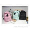 Fashion polyester customize Logo trend high school bag simple color travel backpacks pendant bags